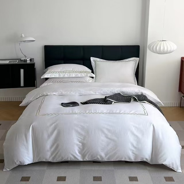 Emsemble drap et couvre lit pour hôtel